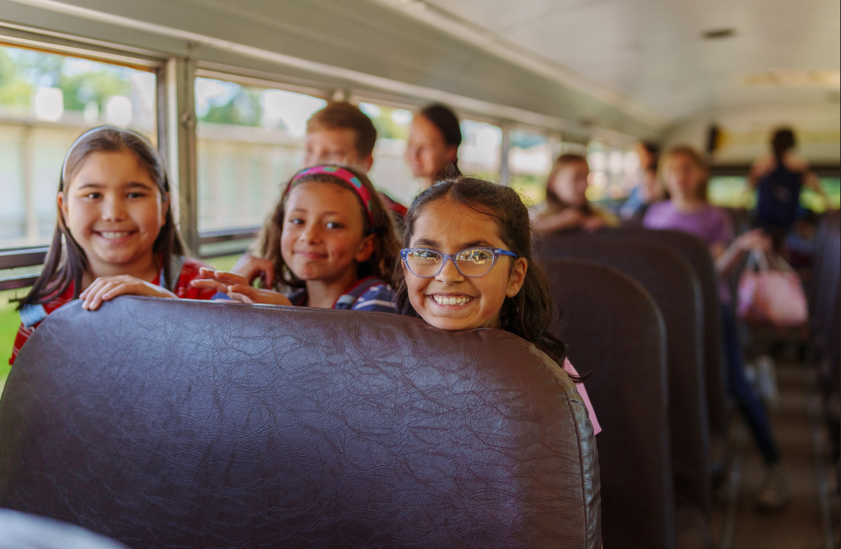 Children riding school bus