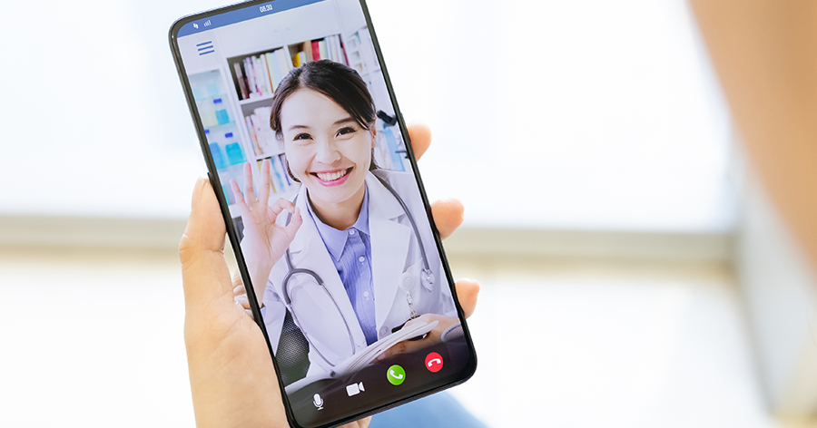 Doctor on mobile phone screen